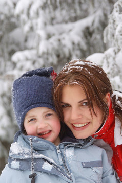 Mother and child in snow