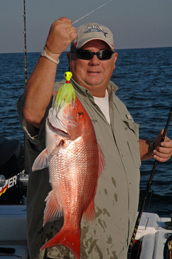 Man holding red snapper