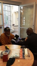 Fire and EMS Blood Pressure Check at Hattie Holmes Senior Wellness Center