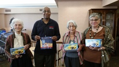 HSEMA awards weather radios to seniors at residential building