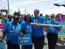 Secretary and Mrs. Wilkins walk with CPIs during the "Walk in thier Shoes" event in Tallahassee