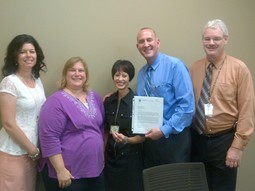 David Abramowitz presents award to Masco Contactor Services