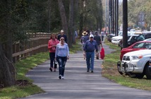 Amelia Island Trail Users walking on trail during a sunny day