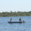 Two people in a boat at Lake Manatee