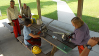 Ridge Rangers practice disassembling a chainsaw