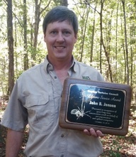 John Jensen with award