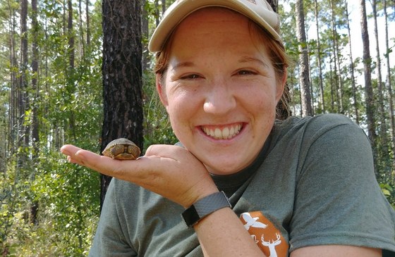 Emily Ferrall with juvenile gopher tortoise