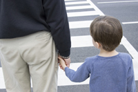 Child and Senior Crossing Street