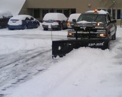 Snow plowing parking lot
