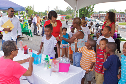 Mayor Rawlings-Blake greets Park Heights residents.