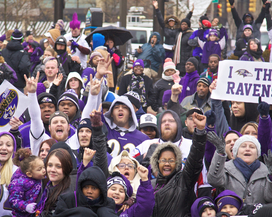 IMAGE: Fans cheer for the Ravens at a pep rally held at Baltimore's Inner Harbor