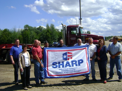 Gorham Sand and Gravel receiving their SHARP banner