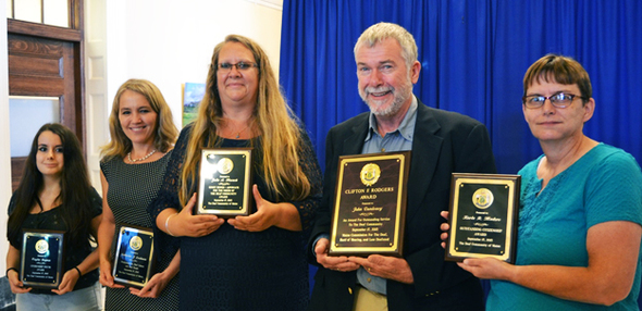 Tea Awardees Stand with their Plaques