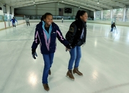 Skaters at Buhr Park Outdoor Ice Arena