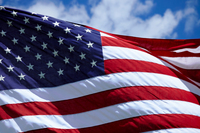 American flag against blue sky