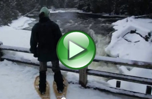 Woman in snowshoes at Tahquamenon Falls