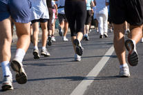 Group of people walking on pavement