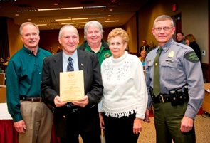 Ovid resident Larry Martin, second from left, was honored as this year's Hunter Education Instructor of the Year.