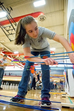 Student archers from across Michigan competed March 8 at the first live National Archery in the Schools state tournament.