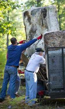 Volunteers clean up trash in Grand Traverse County.