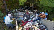 Volunteers clean up trash in Grand Traverse County.