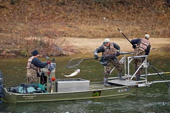 fisheries biologists on a boat