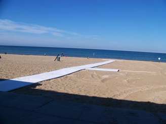 A walkway at Grand Haven State Park that leads up close to the waterfront.