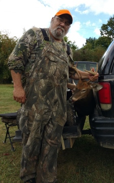 Hunter Ray Norris with buck he harvested