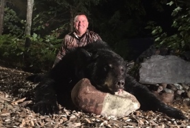 Pure Michigan Hunt winner Eurich with harvested bear
