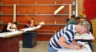 Students at work at Great Lakes Boat Building School