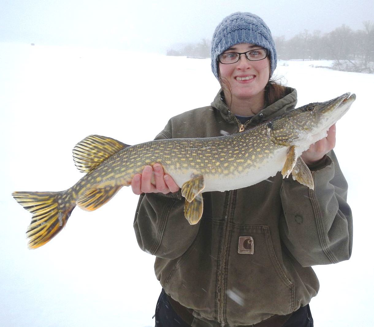 BOW participant displays ice fishing catch