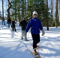 People snowshoeing and cross-country skiiing