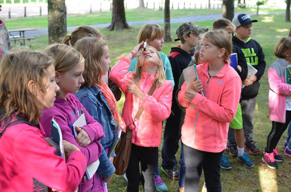 Students enjoy a Forestry Field Day at Presque Isle Park in Marquette County.