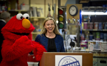 Commissioner with Elmo