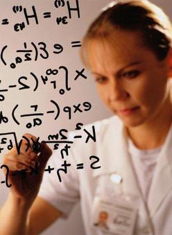 Woman writing scientific formula