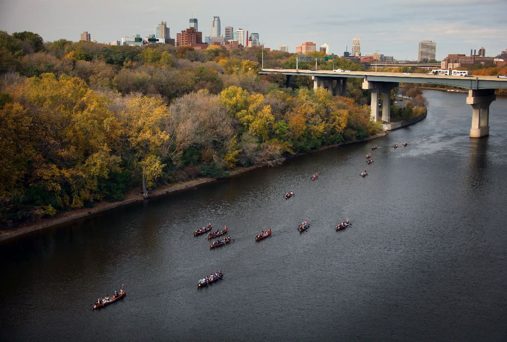 Wilderness Inquiry's voyaguer canoes, or big boats, are a common site on the Mississippi in the Twin Cities