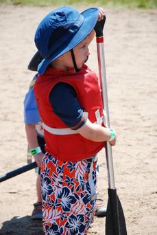 Boy with paddle