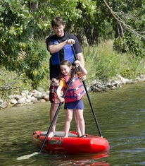 Family paddleboarding