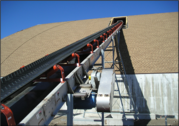 Conveyor systems that fill a salt storage facility from its highest point maximize facility capacity and improve safety.