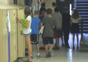 Students in school hallway between classes