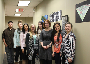 Commissioner Cassellius and student artists from ACGC