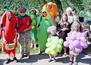 Winona Public Schools staff dress up as fruits and veggies for local parade