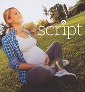 pregnant woman sitting in the sun