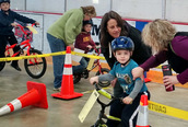 Walk Bike Fun event photo of kid learning to ride a bicycle