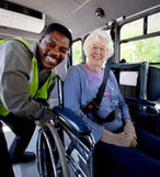 Metro Mobility driver and passenger.