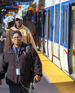 Riders on Blue Line train platform