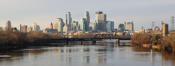 Downtown skyline reflected in Mississippi River.