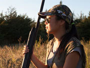 A young woman dove hunting.