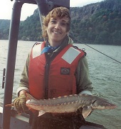 fisheries biologist with sturgeon