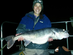 Woman holding a huge walleye